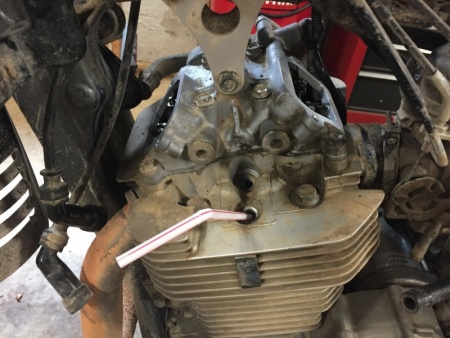 DR650SE using a straw.